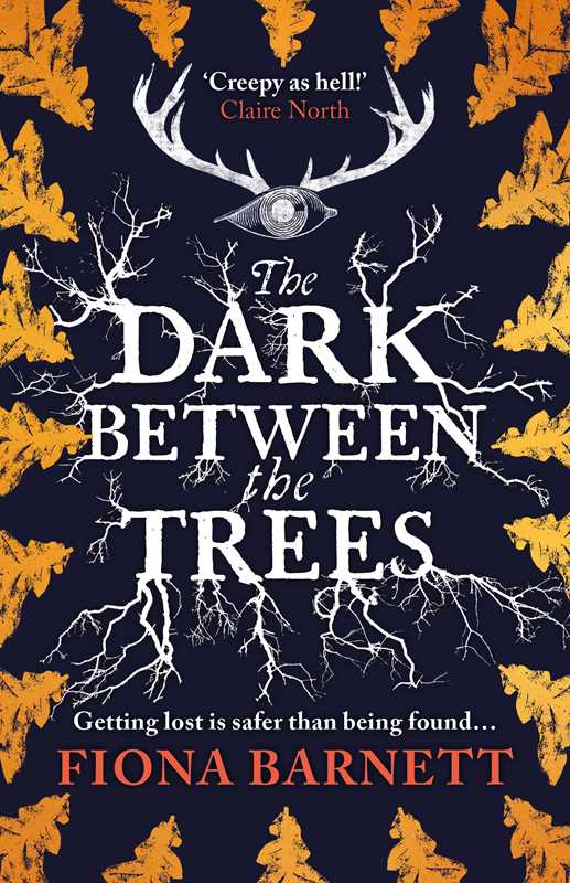 Book cover of 'The Dark Between the Trees' with a dark background, white text, and yellow tree silhouettes.
